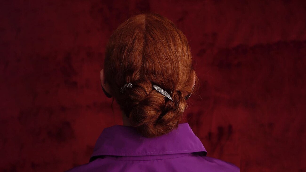 Dettaglio raccolto, chignon intrecciato